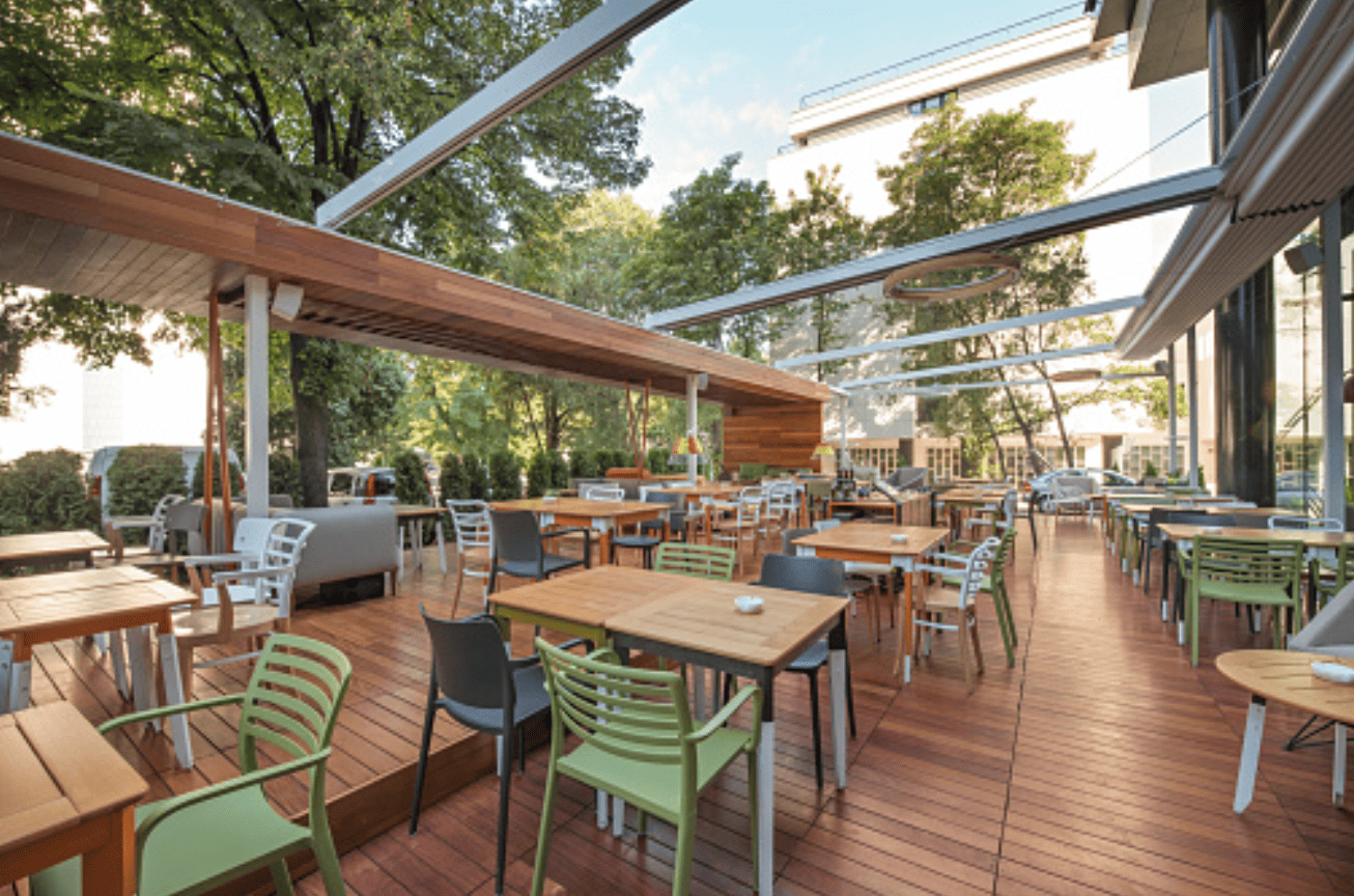 Enjoy Outdoor Dining Year Round with Restaurant Pergola Enclosures